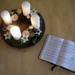 advent wreath and hymn book